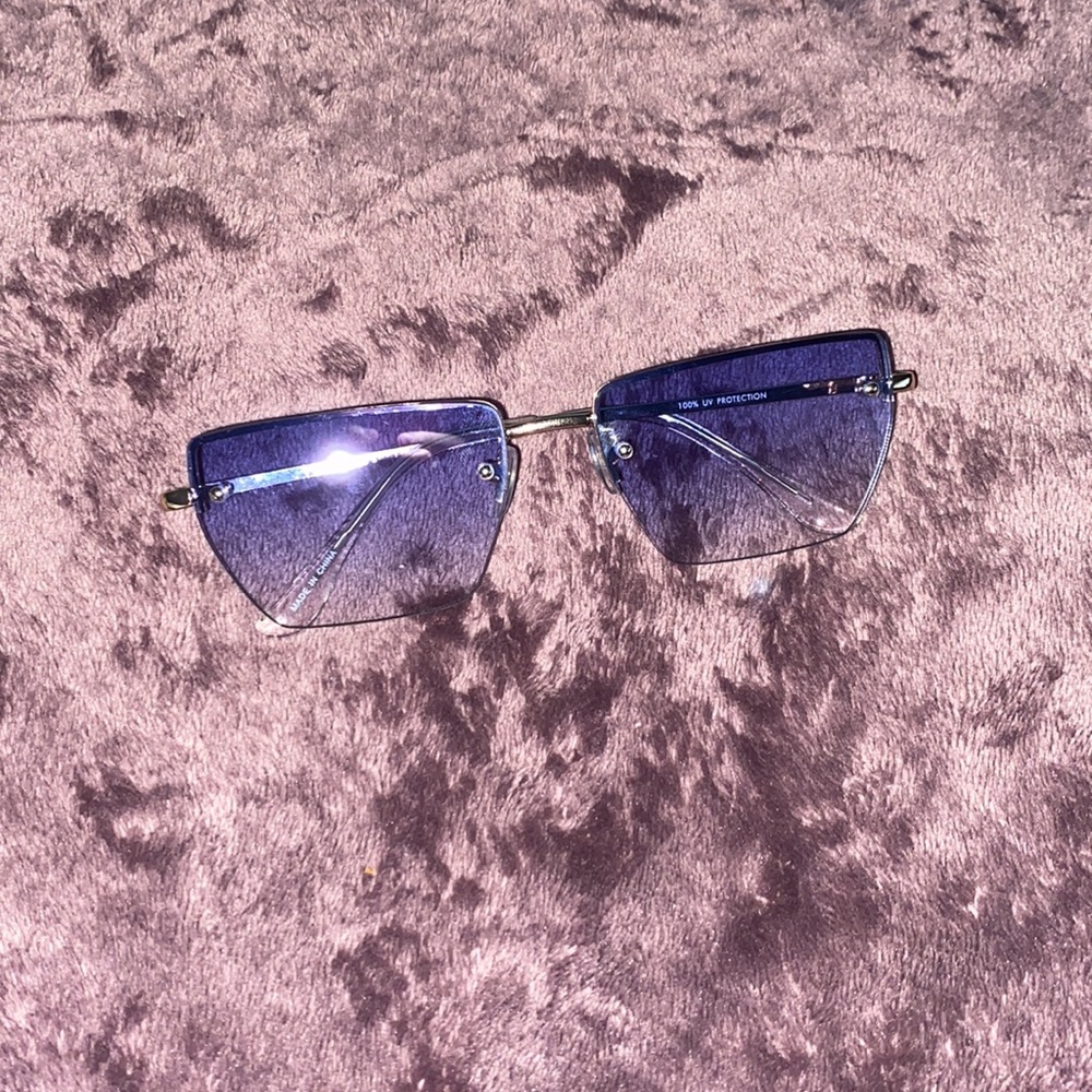 Blue rimless sunglasses